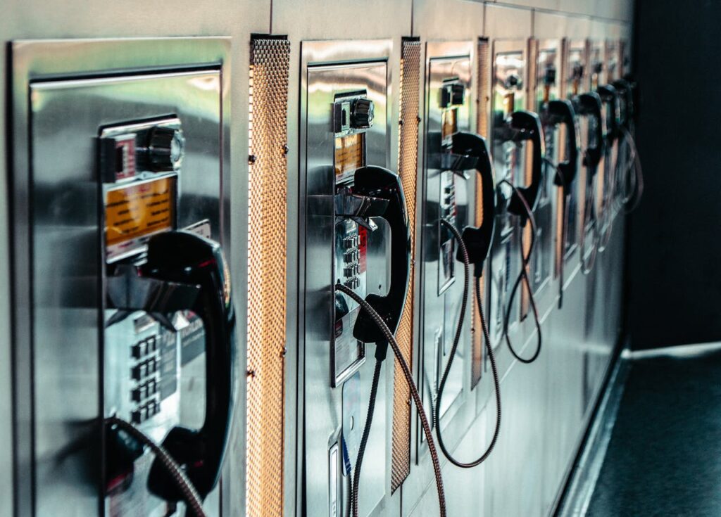 A Row of Coin Operated Telephones